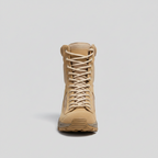 A single mid-cut tactical boot in tan suede and synthetic fabric, shown from the front on a light gray background.