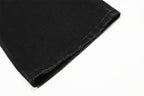 Black fabric roll on a white background