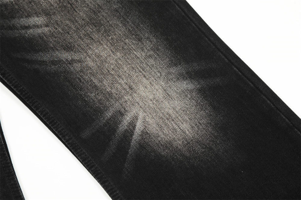 Close-up of black fabric texture on a white background