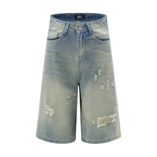 Distressed denim shorts on a white background